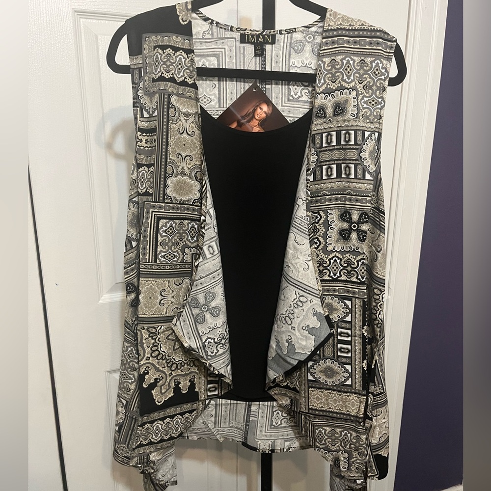 WOMEN’S SZ XS/S IMAN TOP SHIRT. # 244
